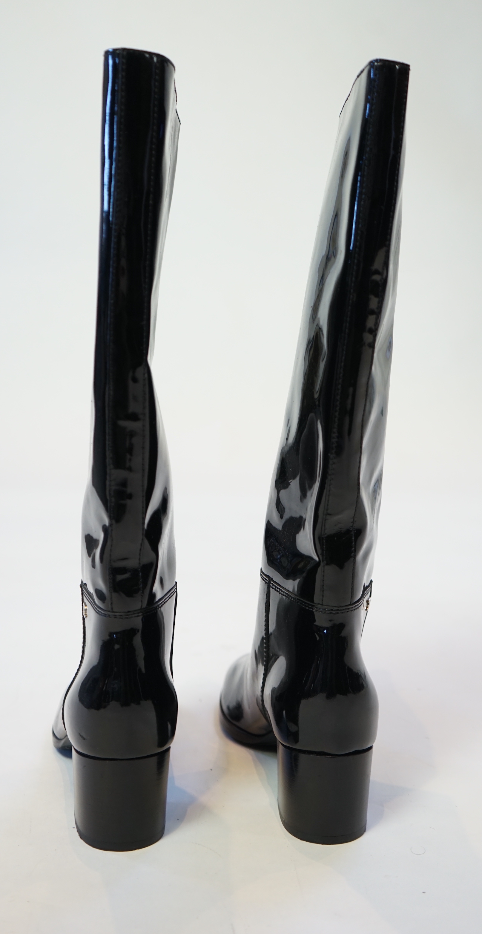 A pair of Chanel lady's black patent knee high mid heel rain boots, size EU 40.5